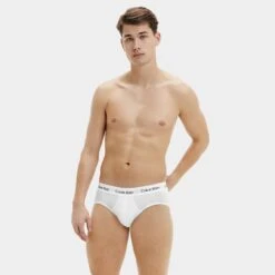 Calvin Klein 3-pack Herenslips Wit -Mode-Lingeriewinkel aHR0cHM6Ly93d3cuYm94ZXJzLm5sL21lZGlhL2NhdGFsb2cvcHJvZHVjdC9jL2EvY2FsdmluLWtsZWluX3UyNjYxZy0xMDBfbW9kZWxfdm9vcmthbnQuanBnP3N0b3JlPWJveGVyc19ubCZpbWFnZS10eXBlPWltYWdl